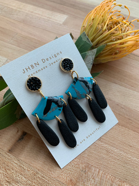 Turquoise Dangle with black Drops and Decorative Posts